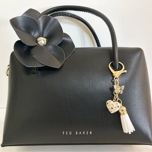 FREE Purse Charm W/Ted Baker Mini Black Satchel with Floral and Pearl Accent.